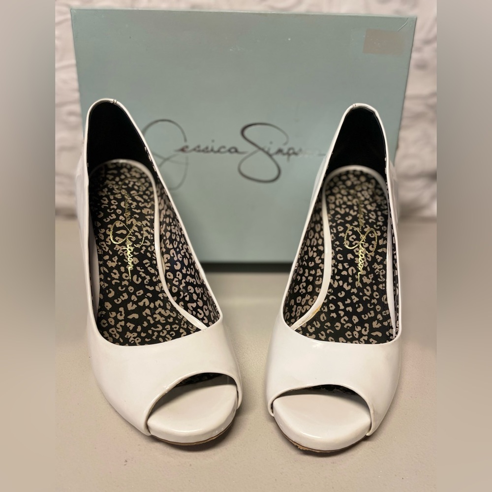 Jessica Simpson Saras white patent peep-toe heels.